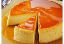 ტორტი შესქელებული რძით Creamy caramel flan topped with glossy orange caramel sauce, with two slices cut to reveal the smooth custard interior.
