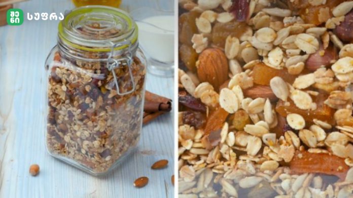 shenisupra-tkbileuli Split image: left a glass jar of granola with a clasp beside cinnamon sticks on a light blue wooden surface; right a close-up of granola with oats, almonds and dried fruit.